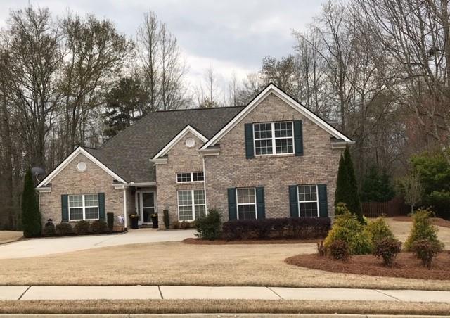 1620 Audrey Ridge Monroe, GA 30656 - Photo 1 of 1 a front view of a house with a yard