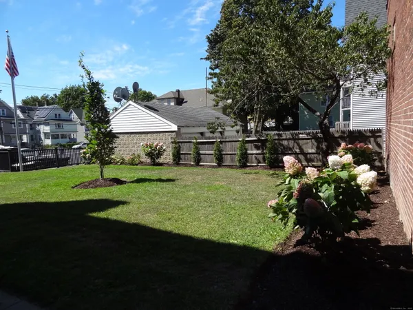 a view of a house with a big yard