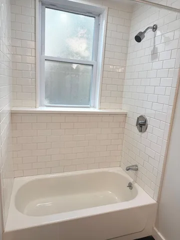 a bathroom with a bathtub