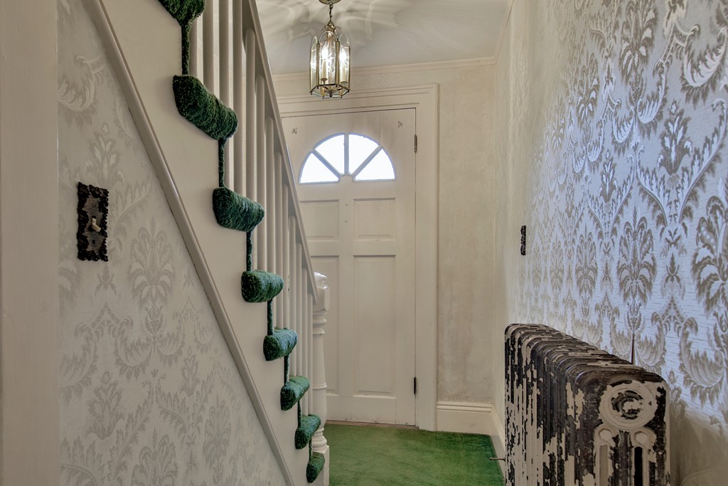 21 Bennett Street Manchester, MA 01944 - Photo 12 of 17 a front view of a house with entryway