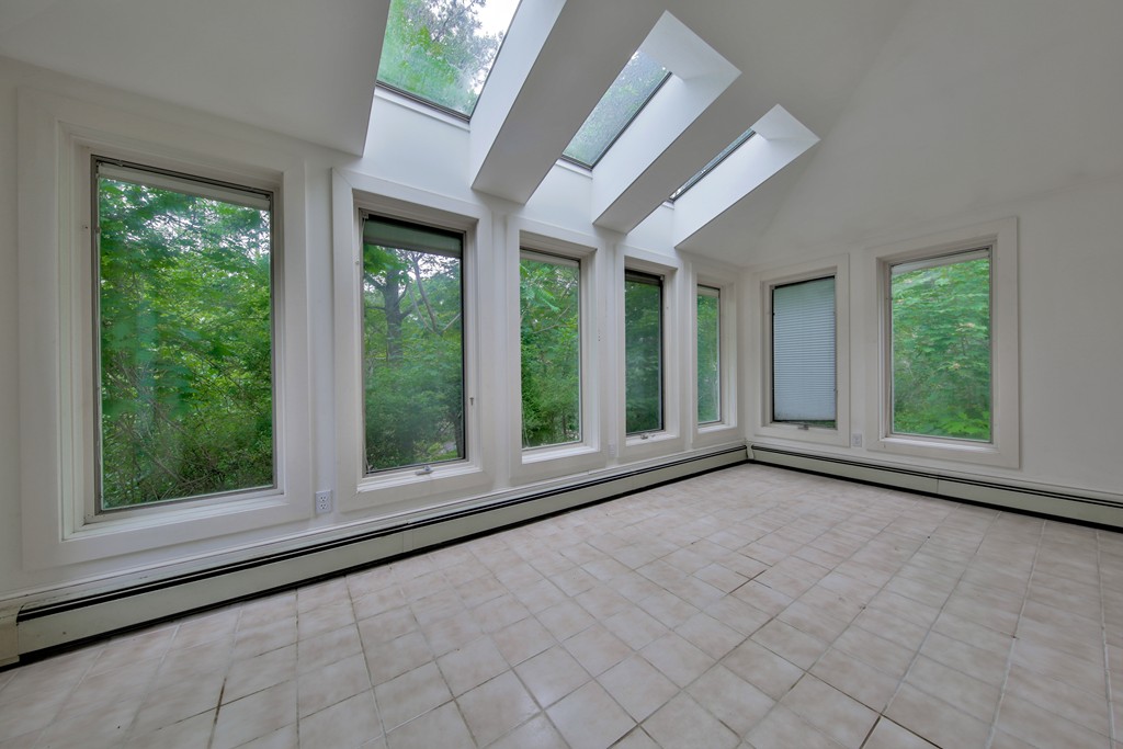 21 Bennett Street Manchester, MA 01944 - Photo 9 of 17 a view of an empty room with a window