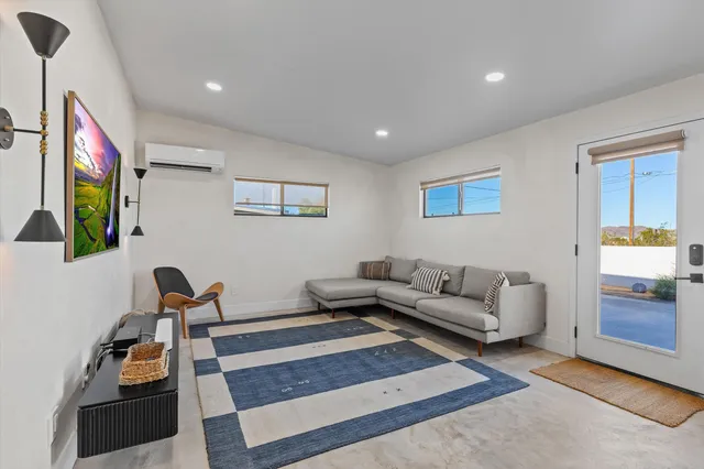a kitchen with stainless steel appliances granite countertop a stove and cabinets