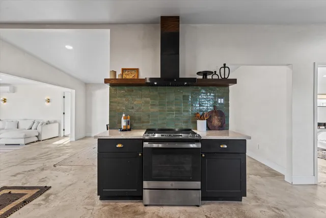 a bathroom with a toilet sink and shower