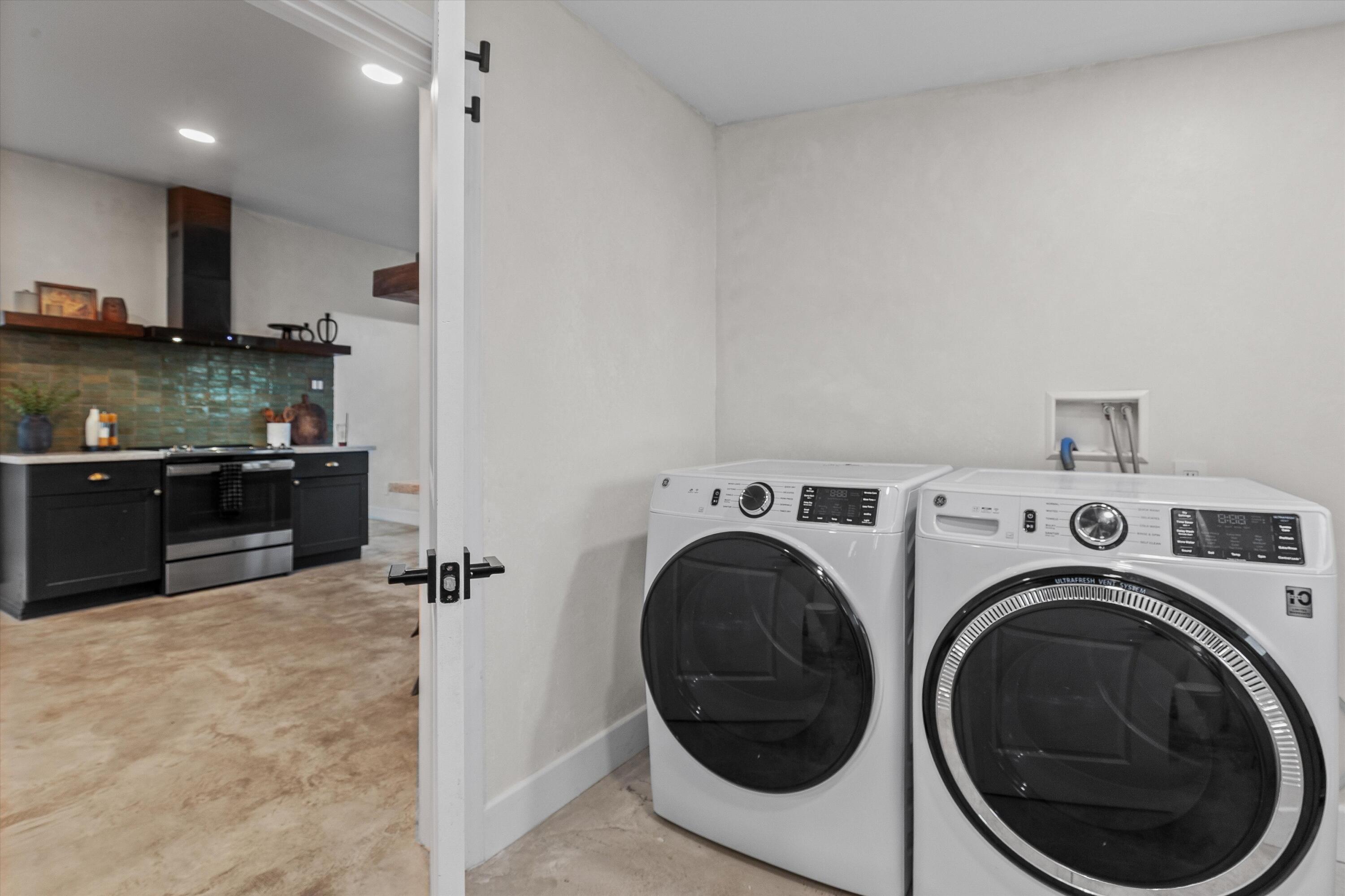 4610 Sunkist Road Joshua Tree, CA 92252 - Photo 23 of 55 a view of a kitchen with washer and dryer