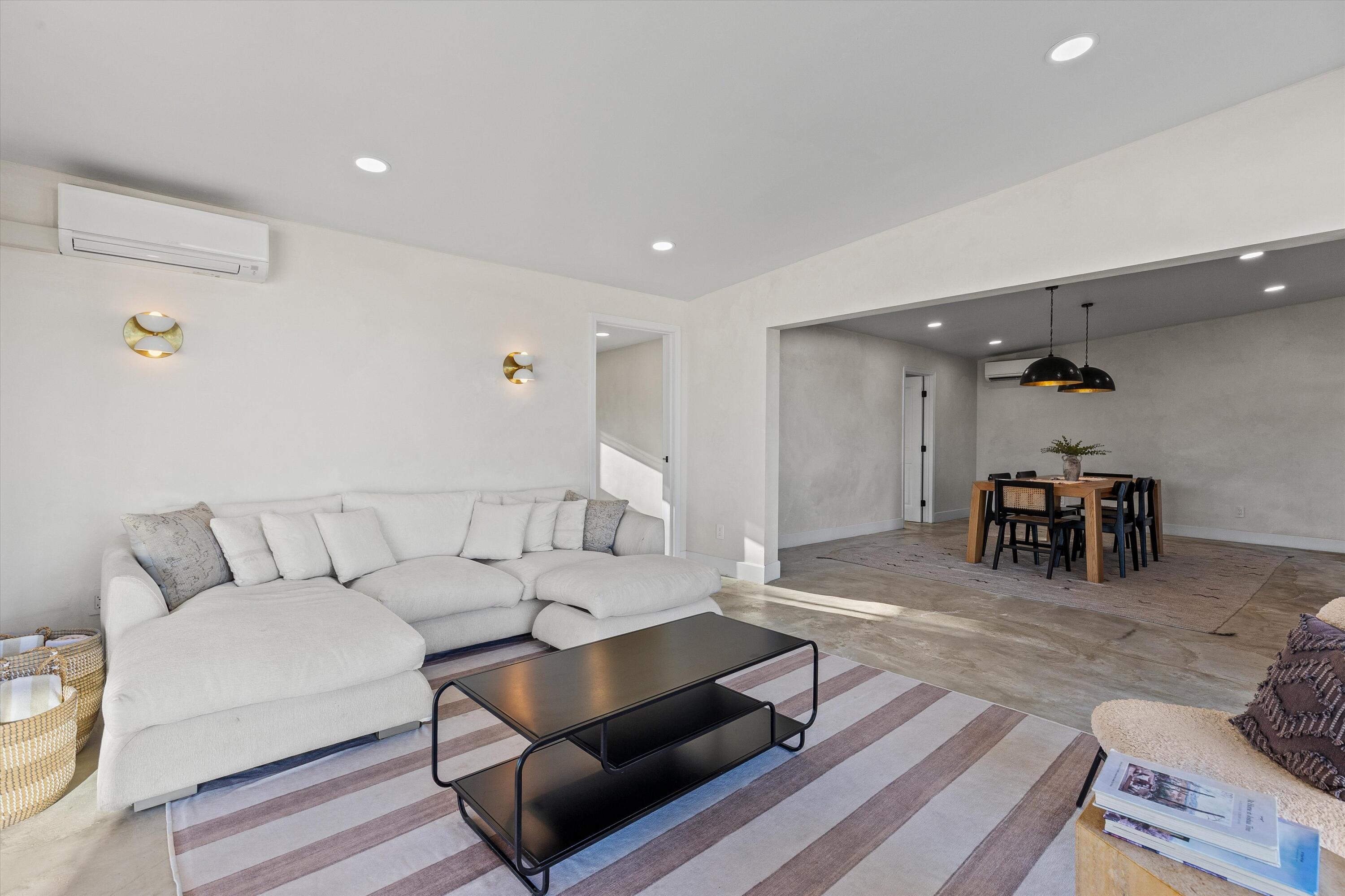 4610 Sunkist Road Joshua Tree, CA 92252 - Photo 29 of 55 a living room with furniture and wooden floor