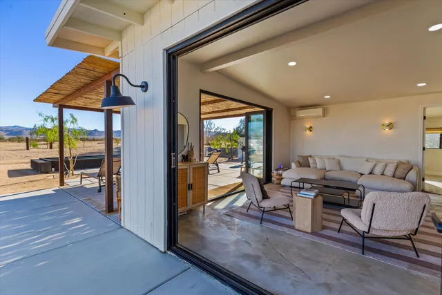 front view of a house with a fountain
