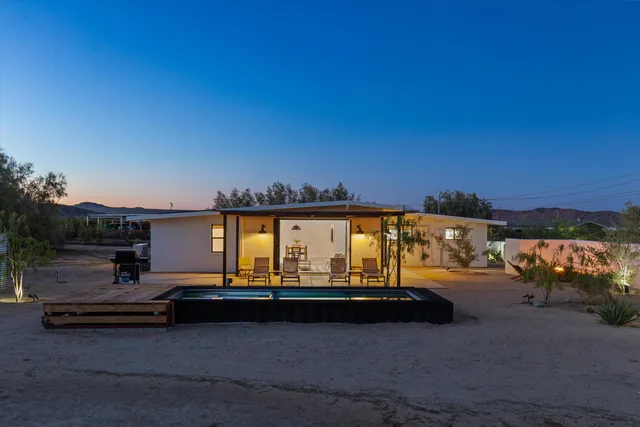 a view of a house with roof deck