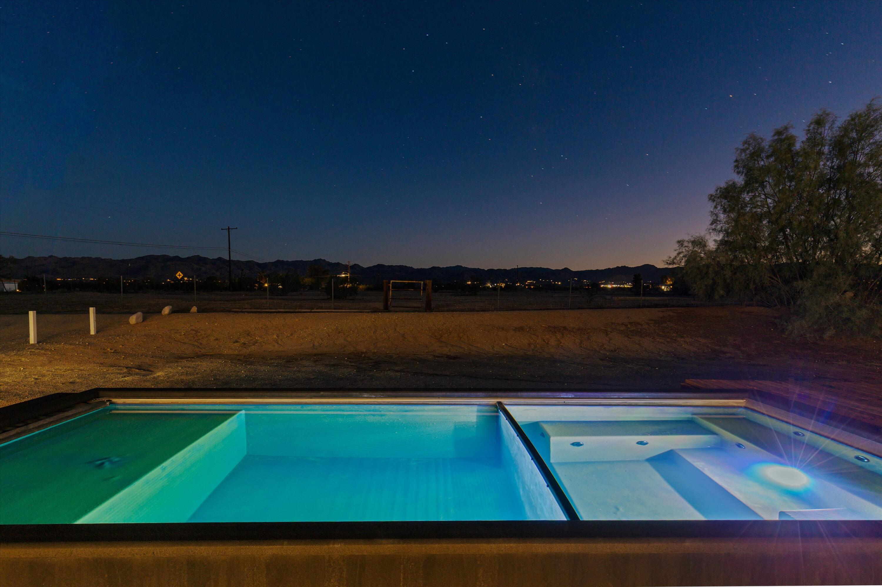4610 Sunkist Road Joshua Tree, CA 92252 - Photo 48 of 55 a view of a swimming pool with a yard and lake view