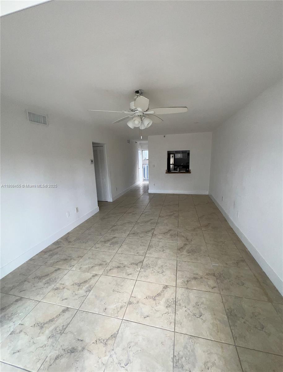 677 Northeast 24th Street, Unit 607 Miami, FL 33137 - Photo 14 of 29 a view of an empty room with a window