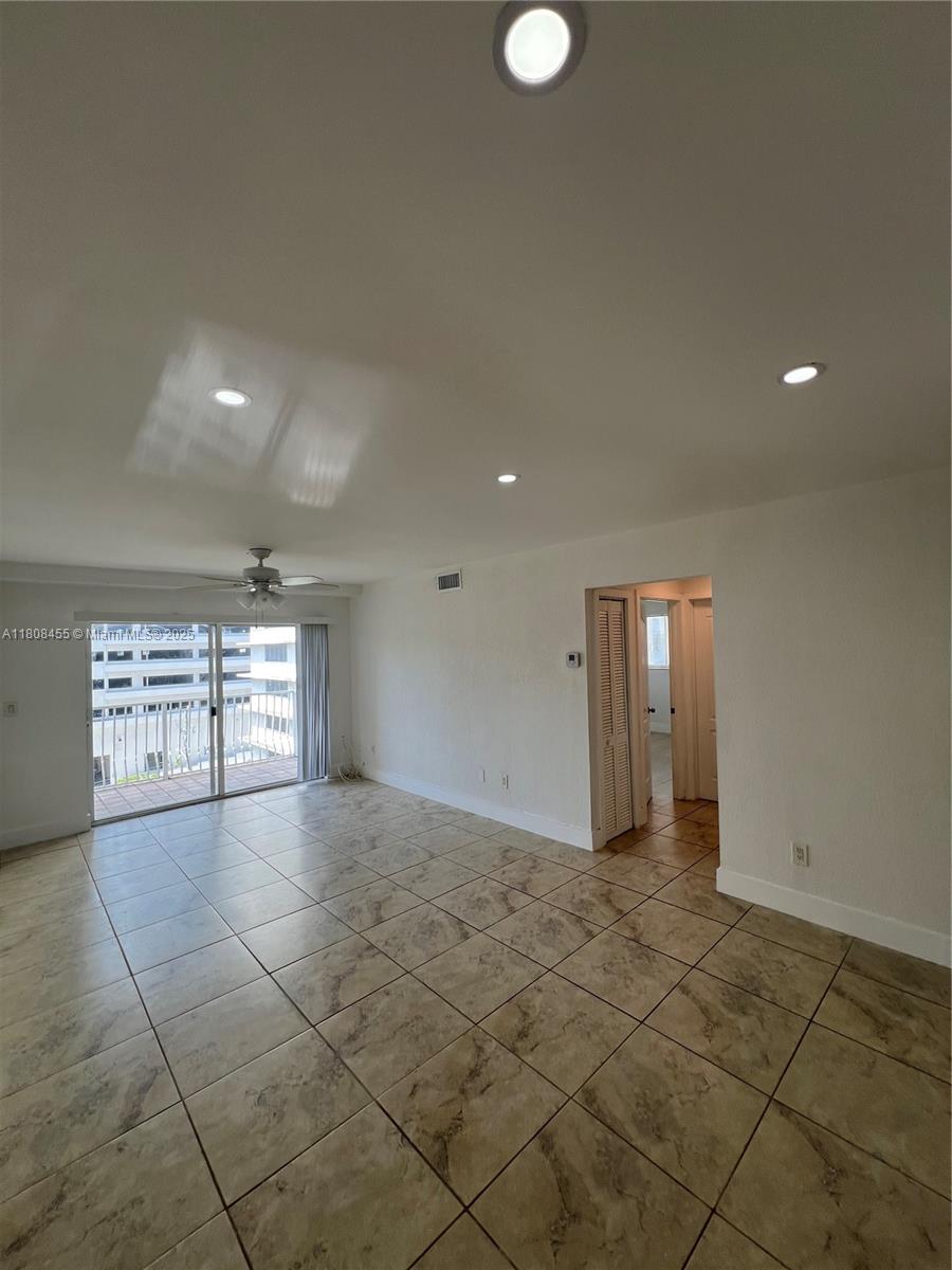 677 Northeast 24th Street, Unit 607 Miami, FL 33137 - Photo 16 of 29 an empty room with windows and entrance