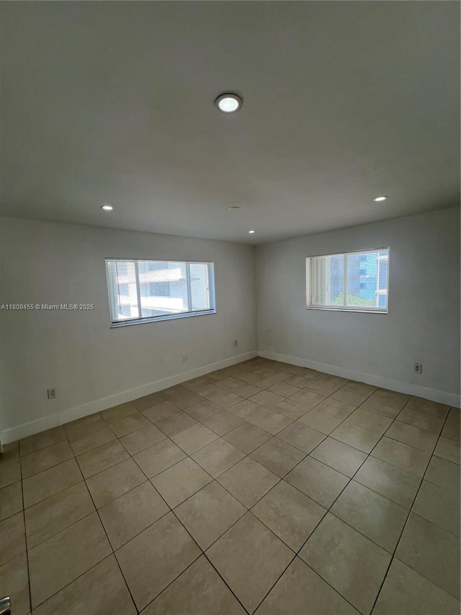 677 Northeast 24th Street, Unit 607 Miami, FL 33137 - Photo 18 of 29 a view of an empty room and a window