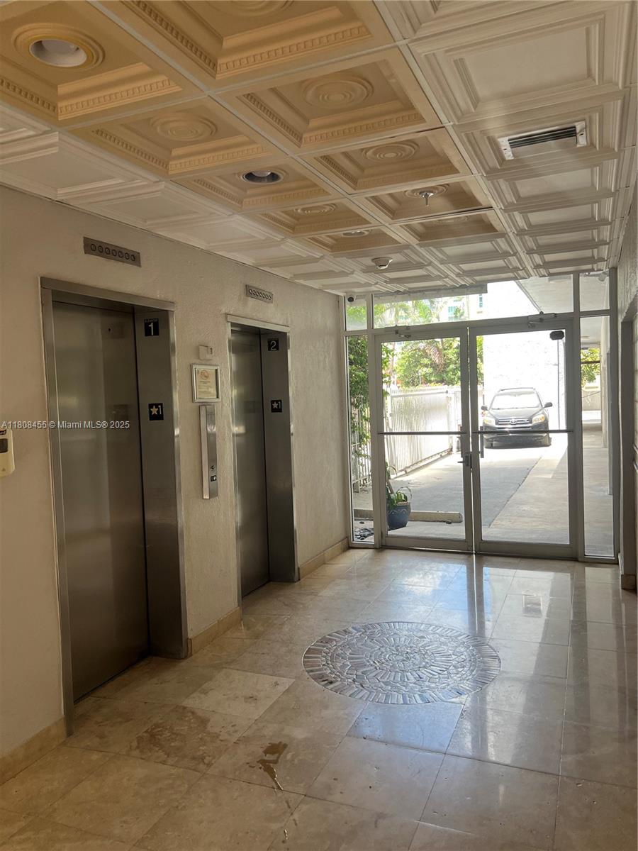 677 Northeast 24th Street, Unit 607 Miami, FL 33137 - Photo 29 of 29 a view of a room with large windows