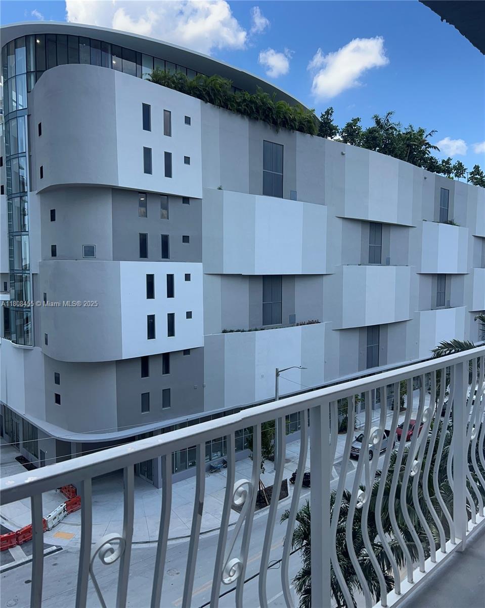 677 Northeast 24th Street, Unit 607 Miami, FL 33137 - Photo 3 of 29 a view of balcony with furniture