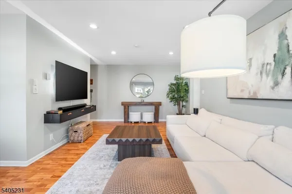 a view of living room with granite countertop furniture and fireplace