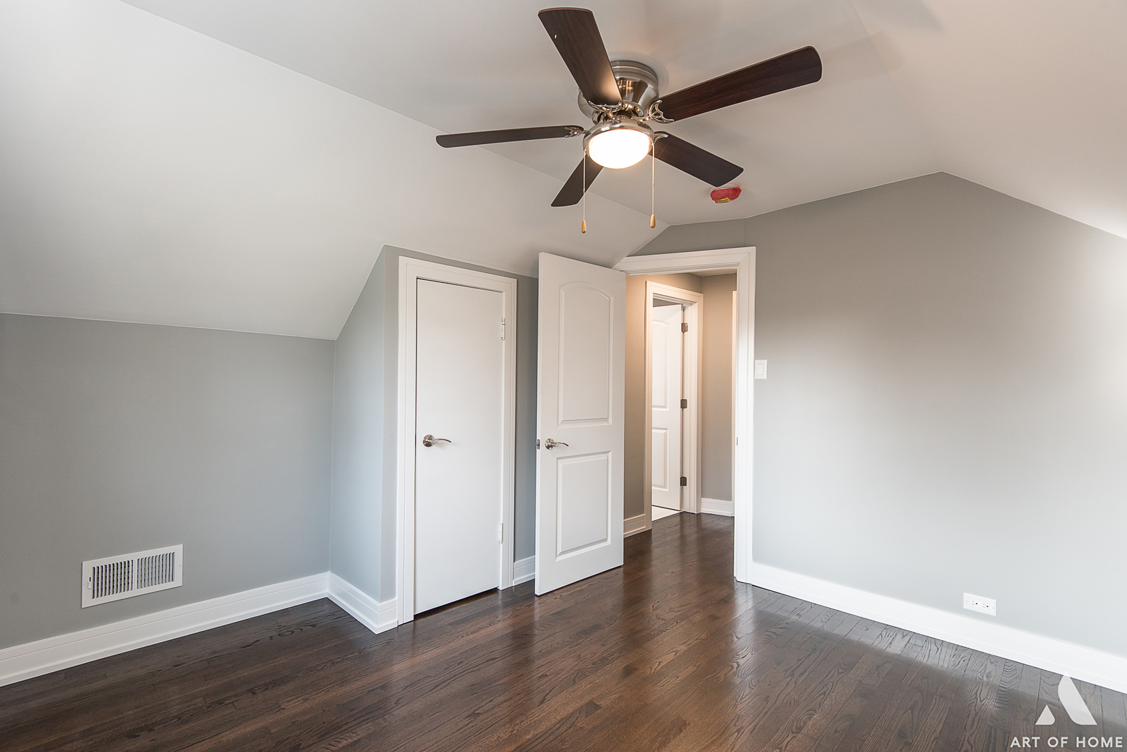 1447 Linden Road Homewood, IL 60430 - Photo 14 of 18 an empty room with wooden floor fan and windows