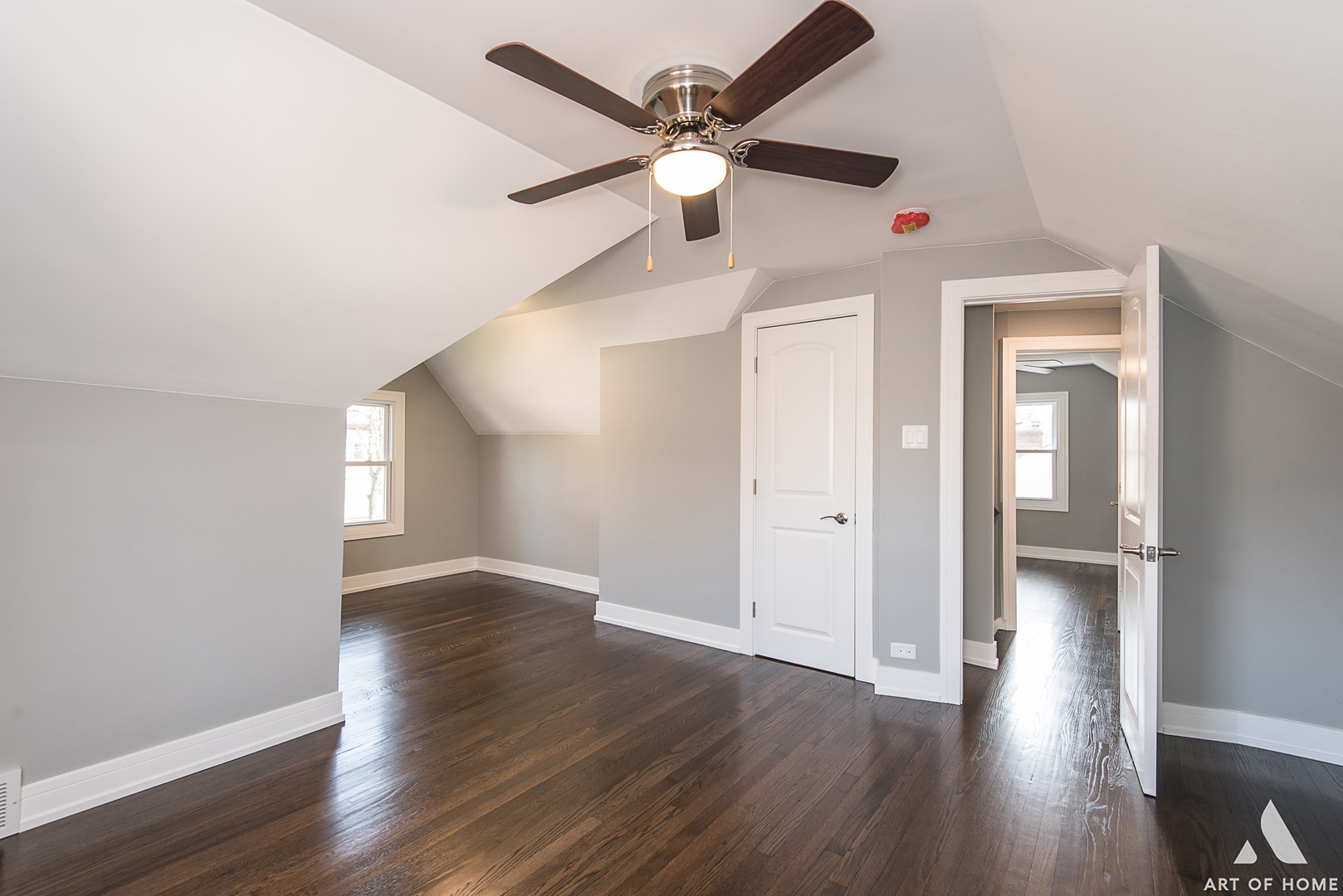 1447 Linden Road Homewood, IL 60430 - Photo 15 of 18 a view of an empty room with wooden floor and a ceiling fan