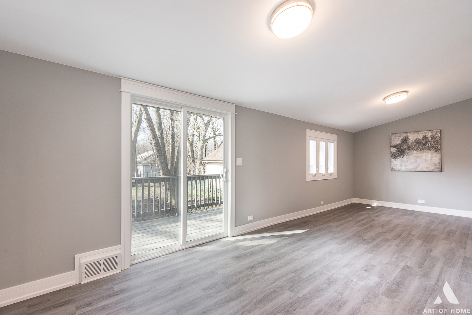 1447 Linden Road Homewood, IL 60430 - Photo 9 of 18 an empty room with wooden floor and windows
