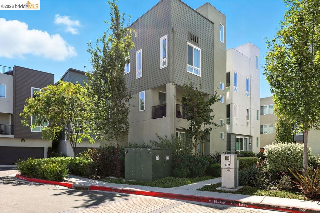 View of building exterior featuring an attached garage