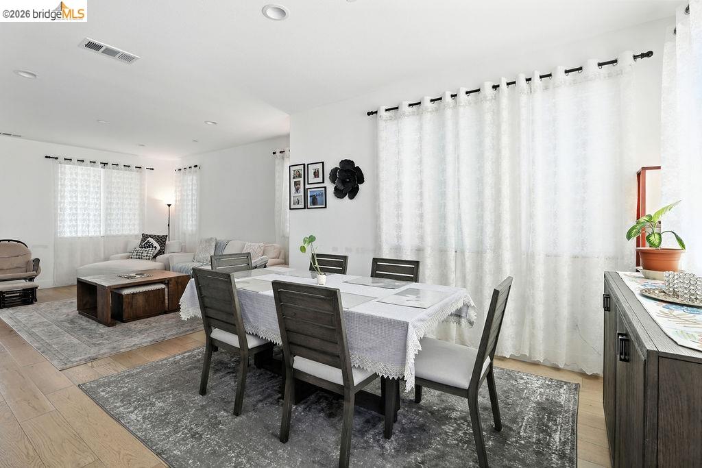 863 Lookout Street Richmond, CA 94804 - Photo 11 of 42 Dining space with light wood-style floors and recessed lighting