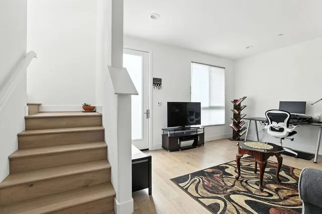 a living room with furniture and a couch