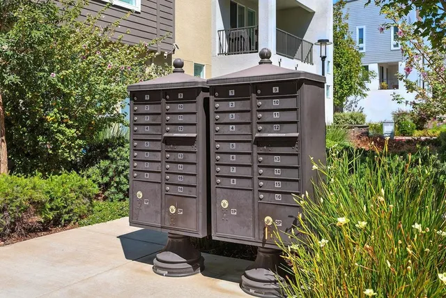 a front view of a building with garden