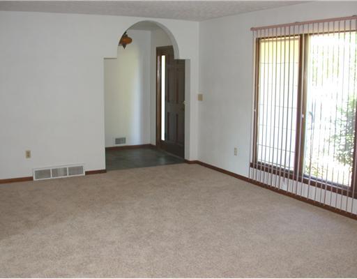 571 Engle Road Ohioville, PA 15052 - Photo 2 of 12 Living Room. 19 ft. Living Rm enhanced by picture window, beautiful design in plaster ceiling and new carpeting in Living Rm, Dining Rm & Family Rm.