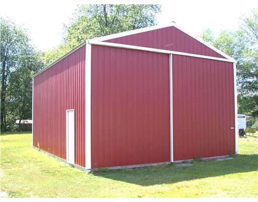 571 Engle Road Ohioville, PA 15052 - Photo 12 of 12 Parking Lot/Garage. 34 x 32 Amish built garage has 17 ft. door to accommodate large RV with 6" reinforce concrete floor and seperate electric panel. Great workshop and storage space.