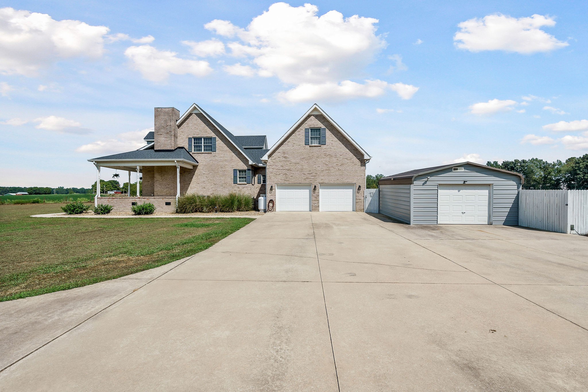 1151 Ball Park Road Morrison, TN 37357 - Photo 3 of 57 a front view of a house with a yard