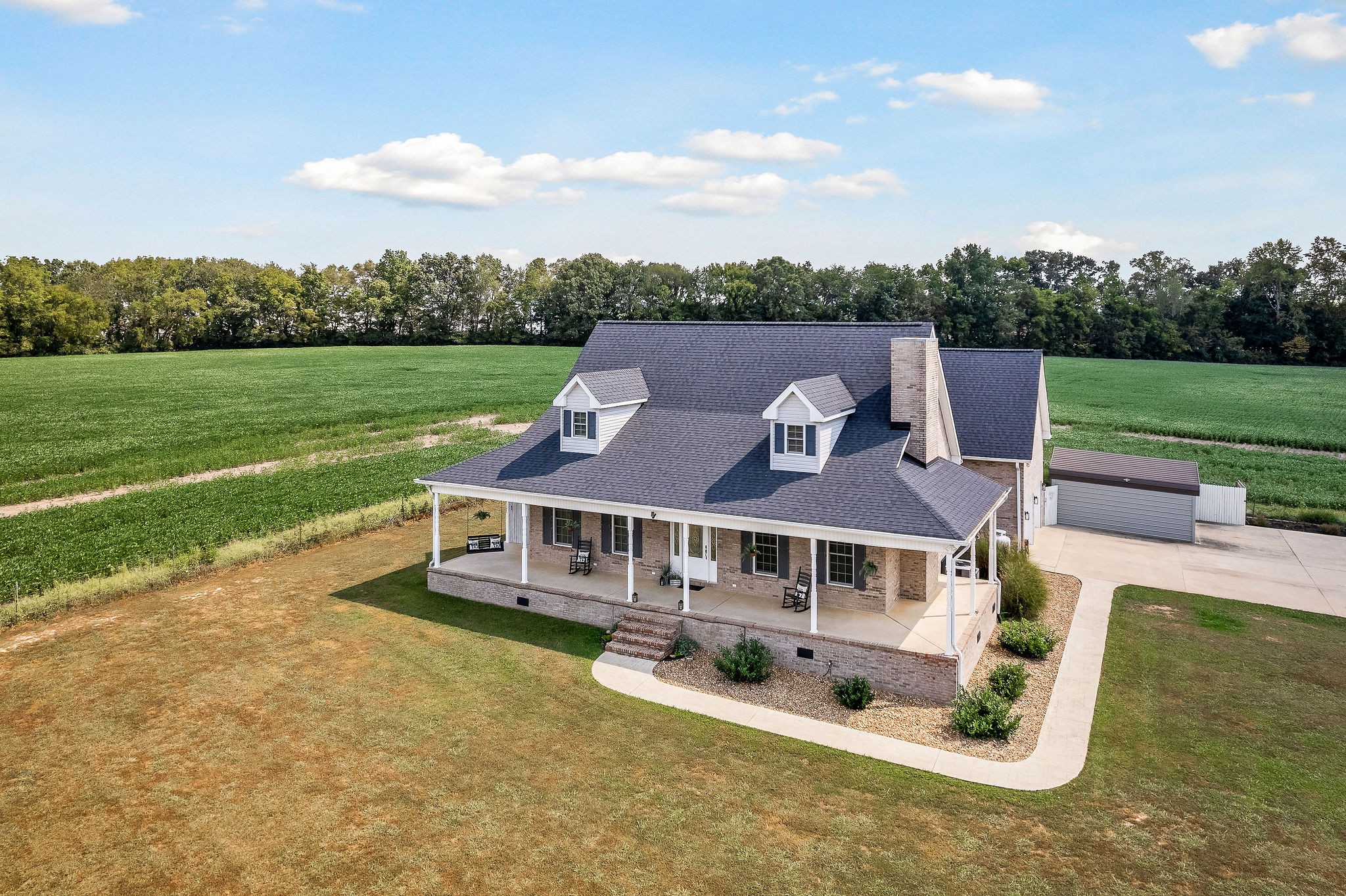 1151 Ball Park Road Morrison, TN 37357 - Photo 4 of 57 an aerial view of a house with swimming pool and a yard