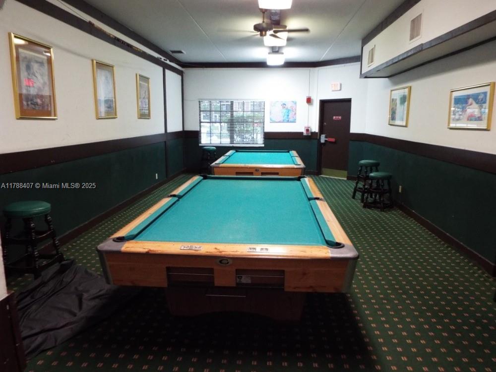 3740 Inverrary Drive, Unit 3D Lauderhill, FL 33319 - Photo 13 of 20 a room with pool table and windows