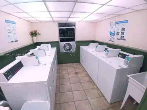 a bathroom with a sink a toilet and bathtub