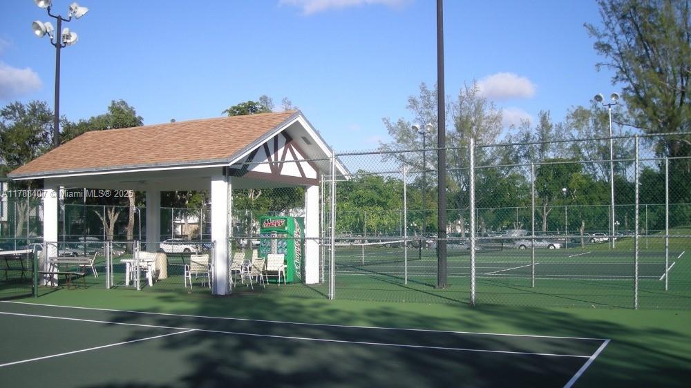 3740 Inverrary Drive, Unit 3D Lauderhill, FL 33319 - Photo 20 of 20 a view of a park that has a lots of windows and plants