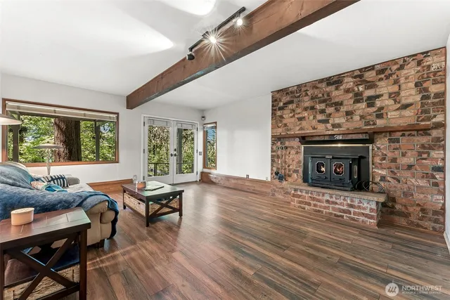 a view of a livingroom with furniture and a fireplace