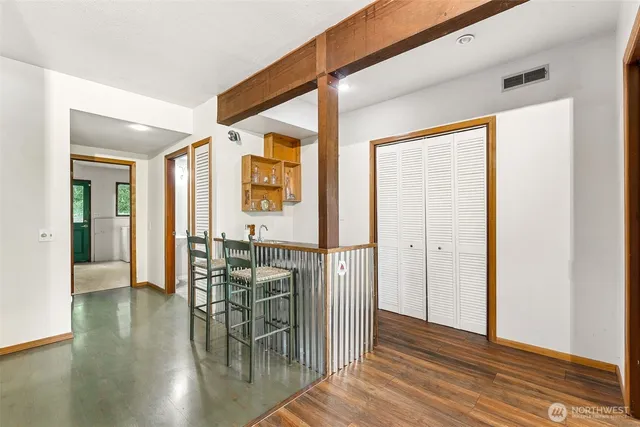 a view of entryway with wooden floor