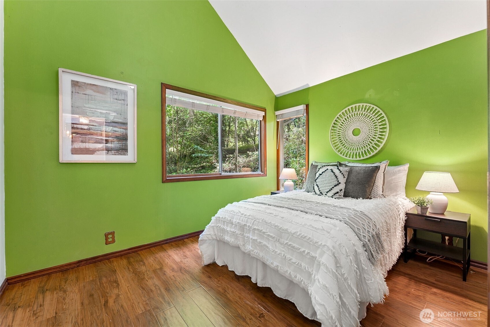 15602 26th Avenue Southwest Burien, WA 98166 - Photo 19 of 27 a bedroom with a bed and windows