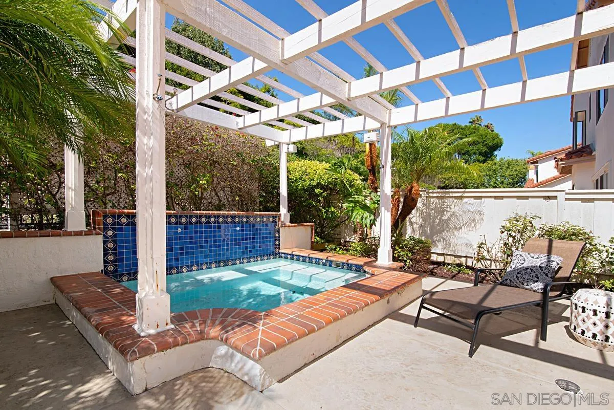 4256 Caminito Terviso San Diego, CA 92122 - Photo 30 of 32 a view of a patio with a table and chairs