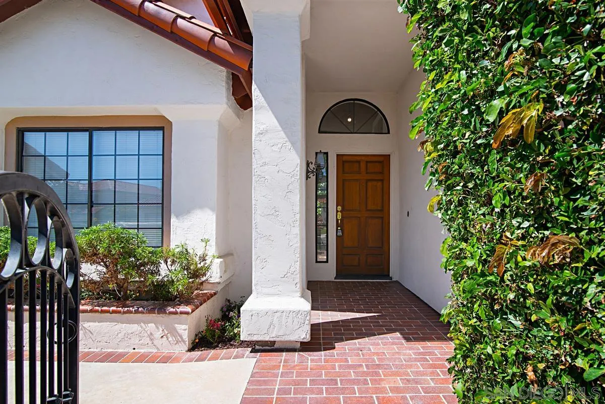4256 Caminito Terviso San Diego, CA 92122 - Photo 3 of 32 a view of a house with potted plants