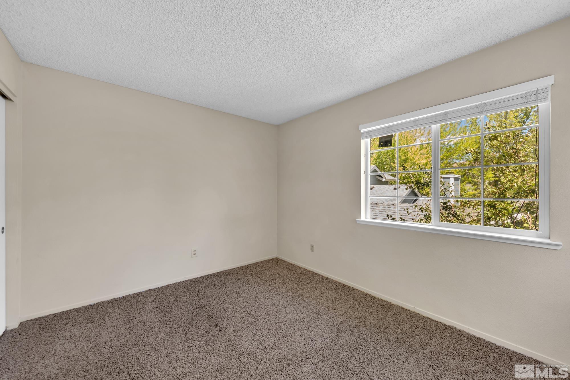 6025 Conness Way Reno, NV 89523 - Photo 24 of 30 an empty room with a window