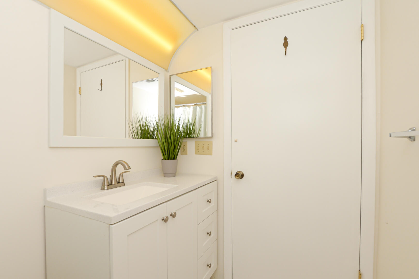 1950 Southwest Palm City Road, Unit 12103 Stuart, FL 34994 - Photo 11 of 26 a bathroom with a sink and a mirror