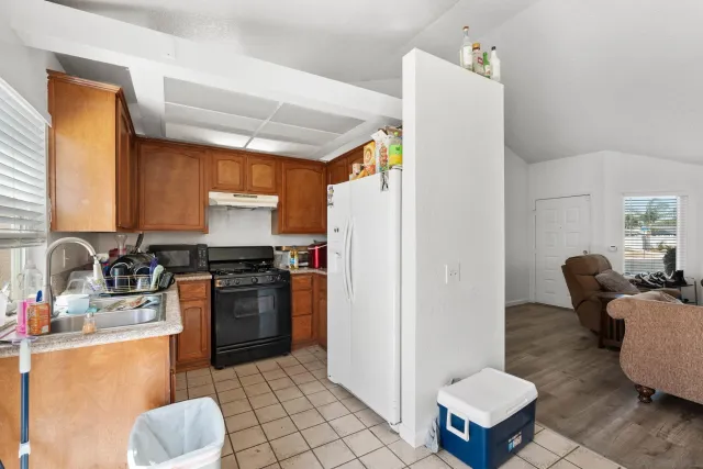 a bedroom with furniture and a bed