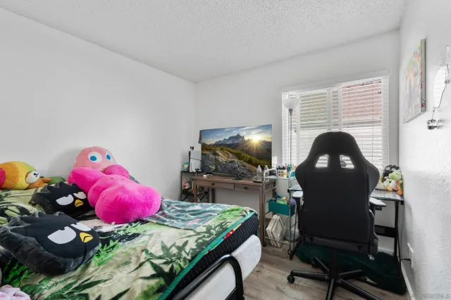 a bathroom with a sink vanity mirror and toilet