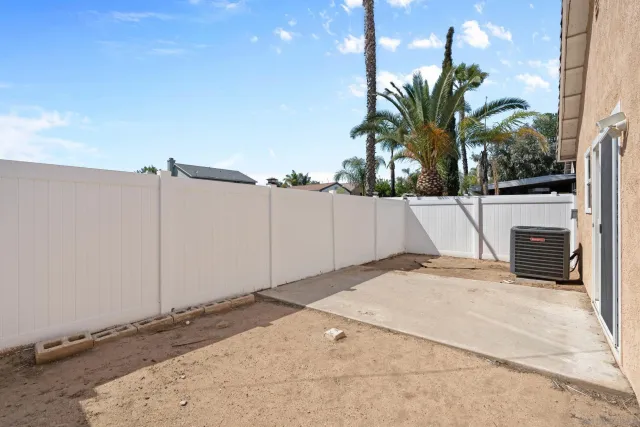 a group of cars parked in front of a house