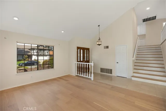 an empty room with windows