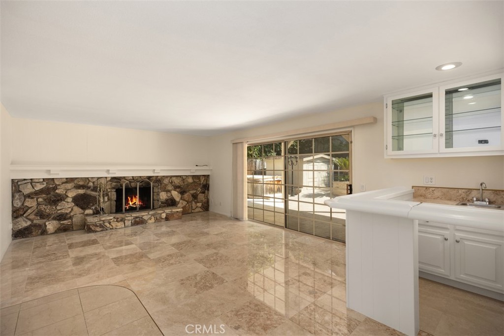 21322 Calle Balsa Lake Forest, CA 92630 - Photo 21 of 45 a large white kitchen with a large window