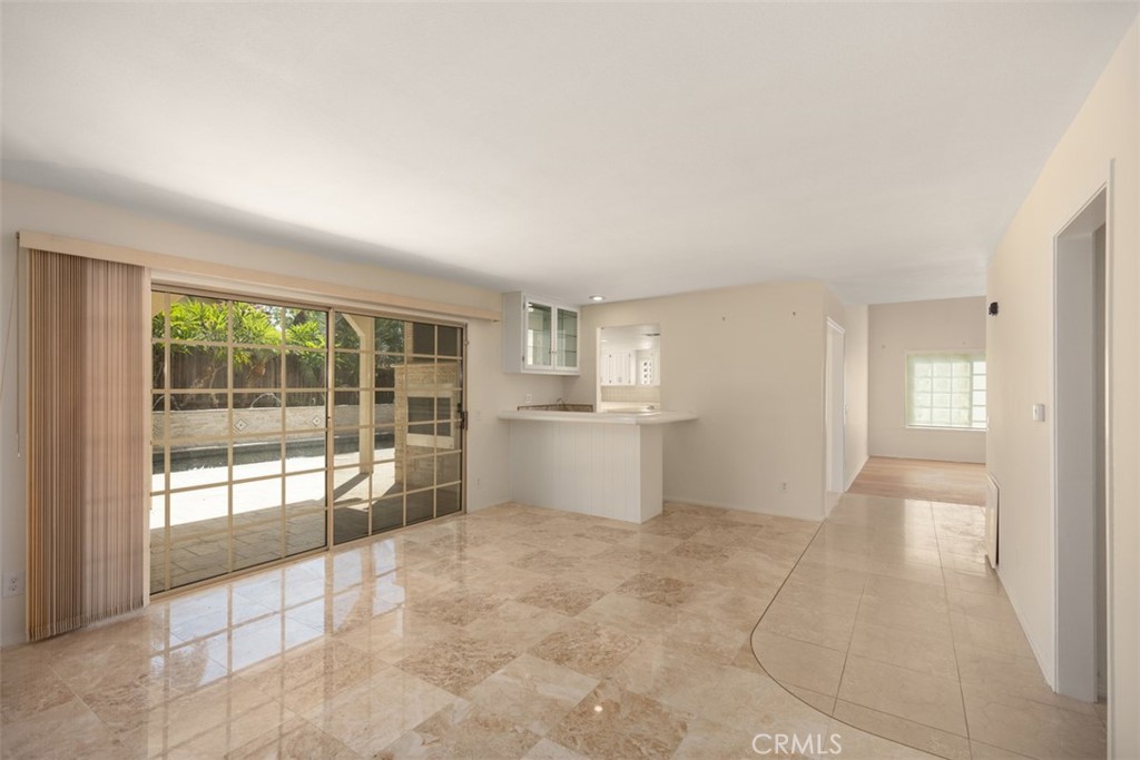 21322 Calle Balsa Lake Forest, CA 92630 - Photo 24 of 45 a view of a big room with windows and entryway of the house