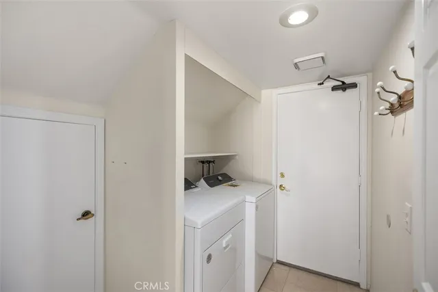 a bathroom with a sink a toilet and a shower