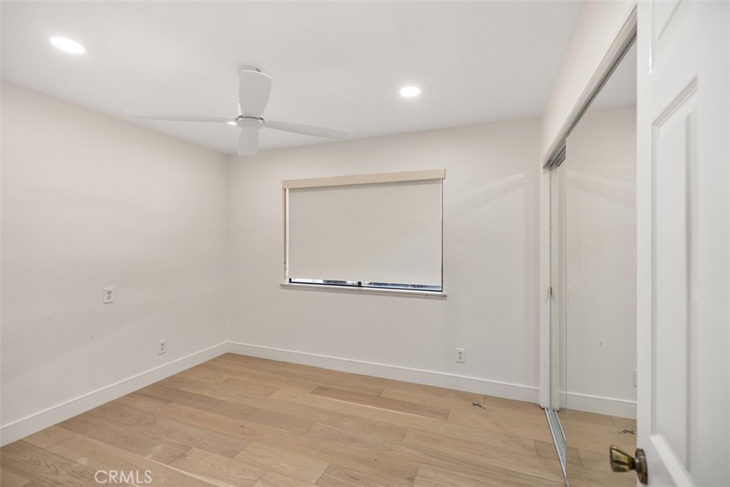 21322 Calle Balsa Lake Forest, CA 92630 - Photo 39 of 45 wooden floor in an empty room with a window