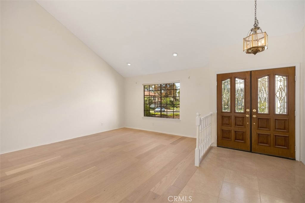 21322 Calle Balsa Lake Forest, CA 92630 - Photo 6 of 45 a view of an empty room with a window