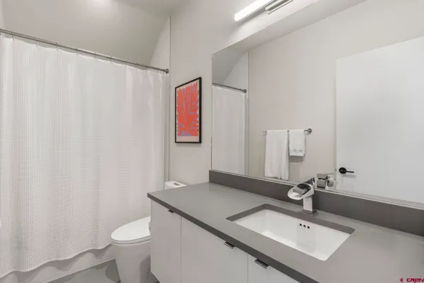 a view of livingroom with furniture and windows