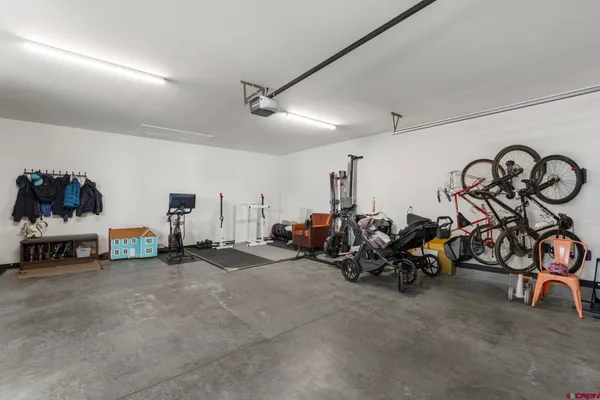 a swimming pool with outdoor seating